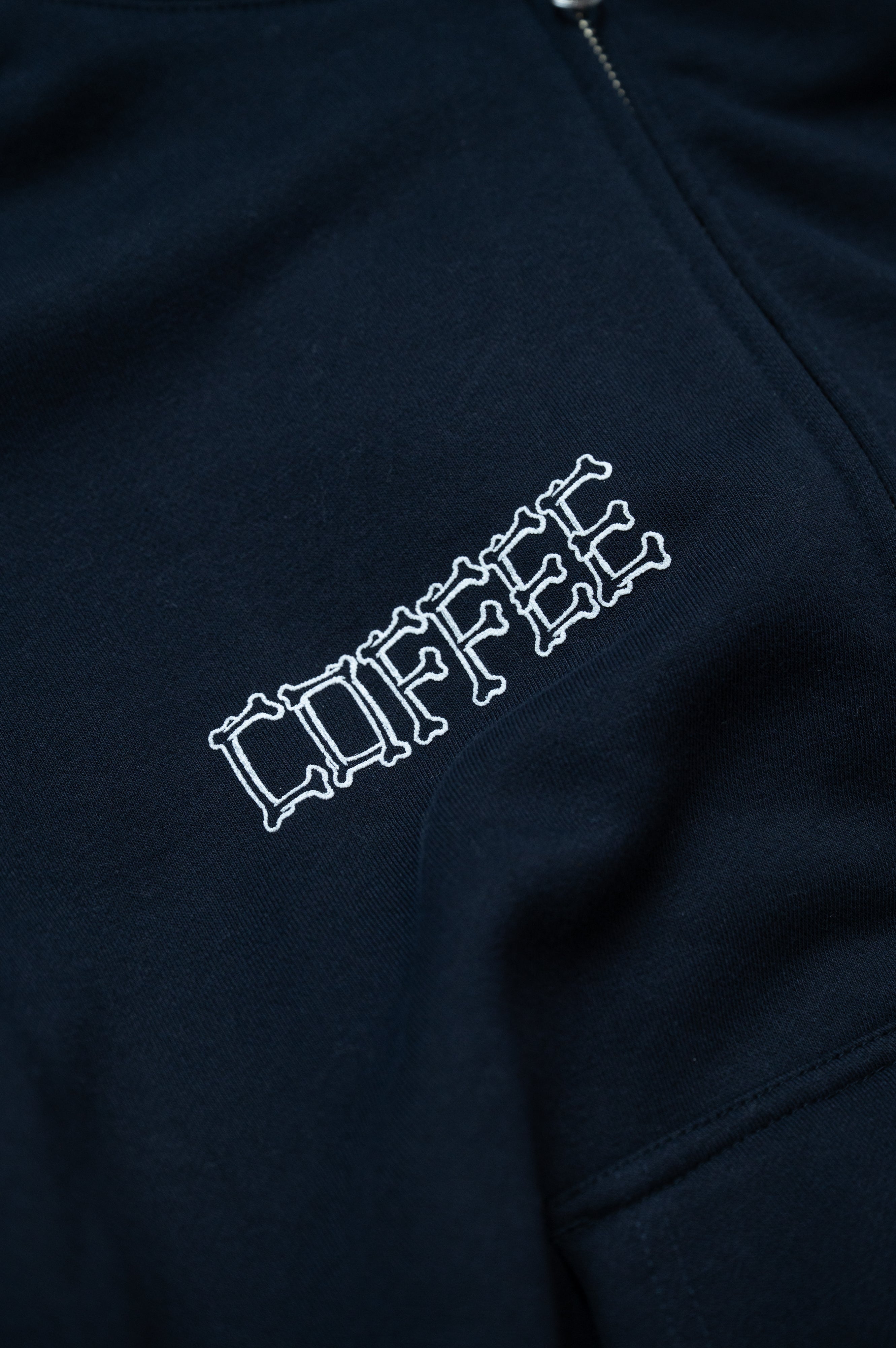 ZHYVAGO Bone Logo Puff Printing Box Silhouette full zip hoodie