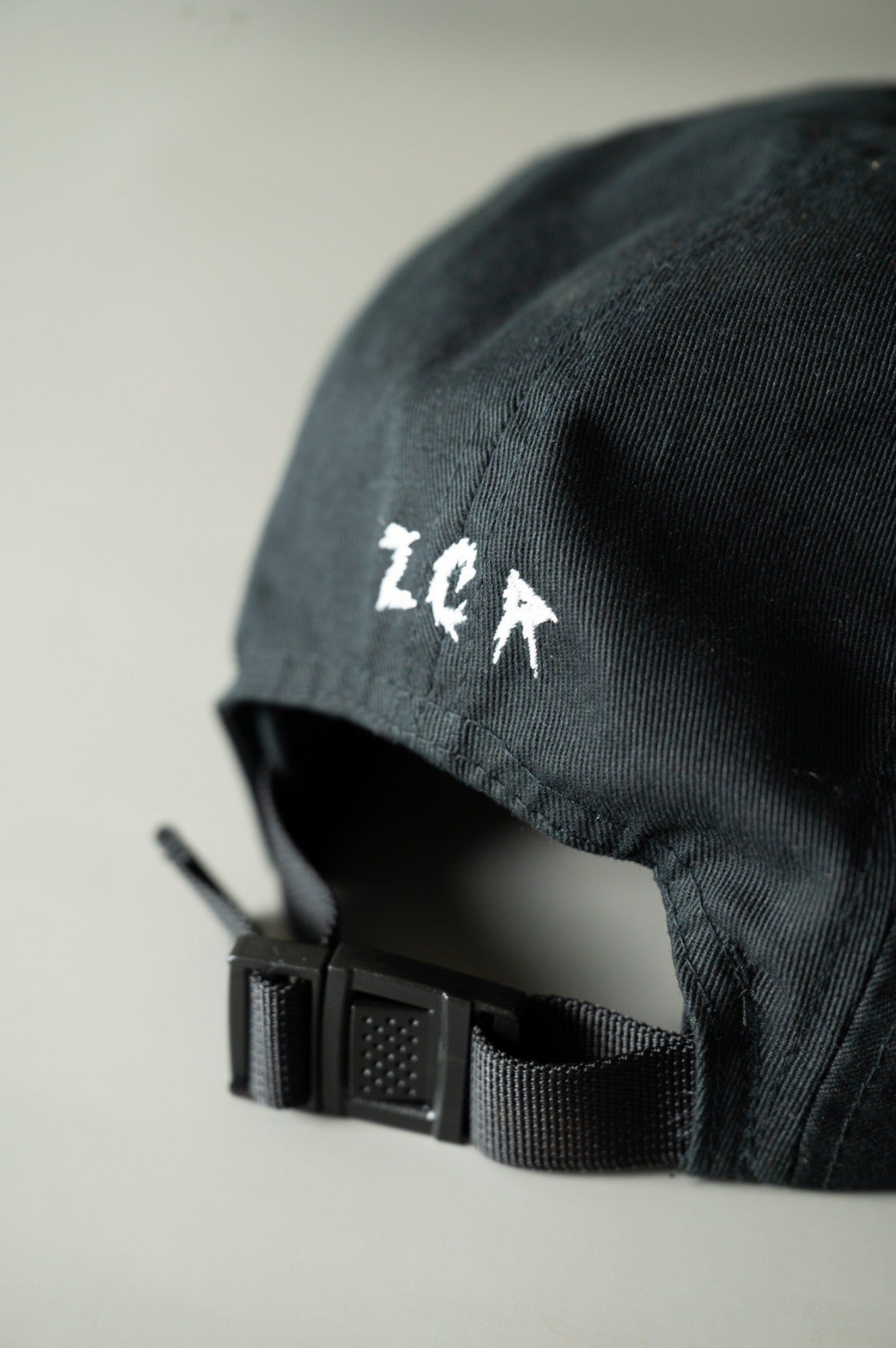 ZHYVAGO Grunge logo JET CAP
